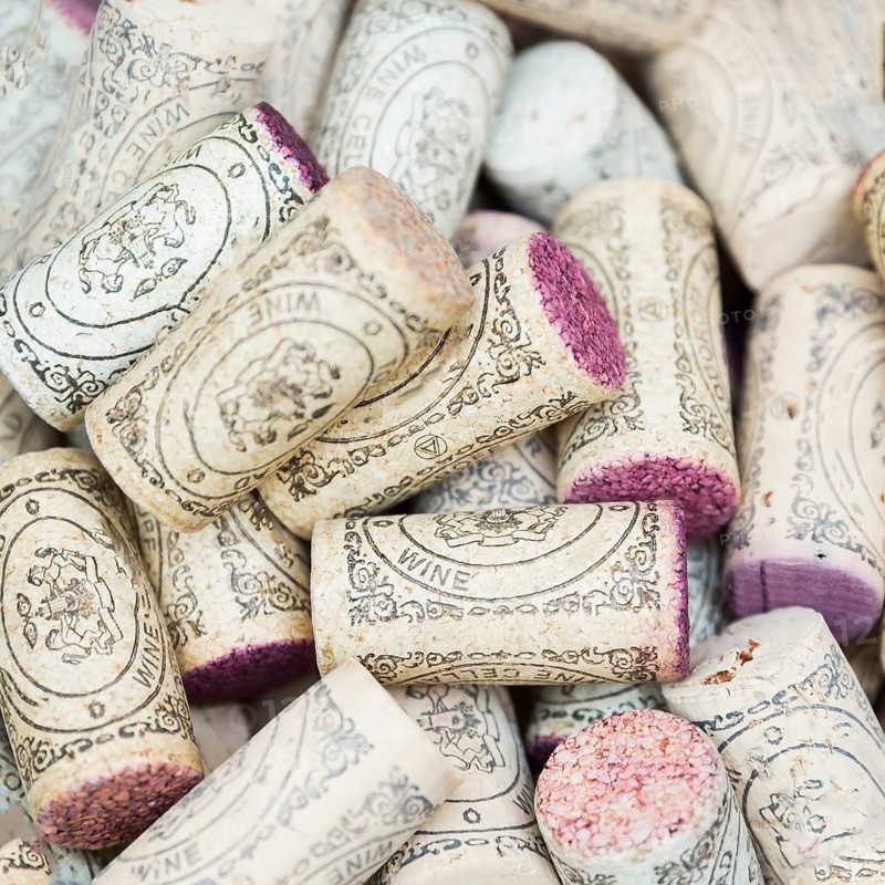 Used wine corks. Square image. A random selection of used wine corks. Closeup pattern background of many different wine corks