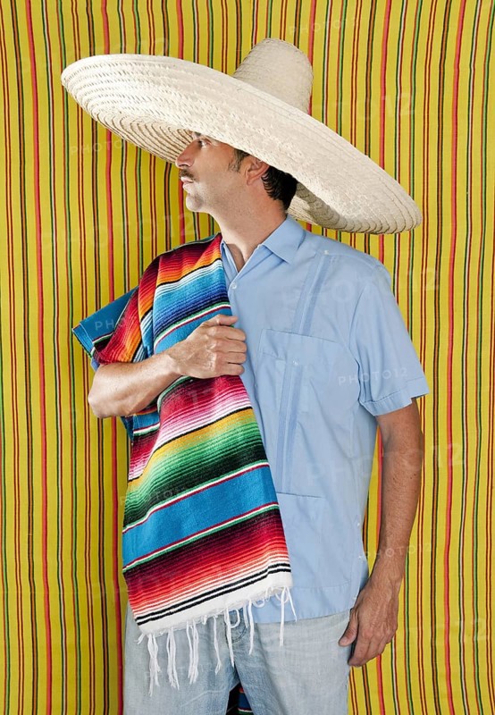 Mexican man serape poncho hat sombrero yellow stripes background