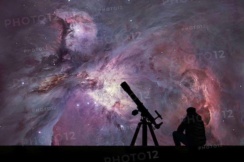 Man with telescope looking at the stars. The Orion Nebula Messier 42 diffuse nebula in constellation Orion. Elements of this image are furnished by NASA