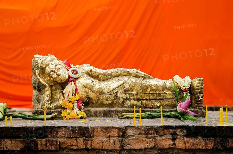 Reclining buddha statue with gold leaf in thailand