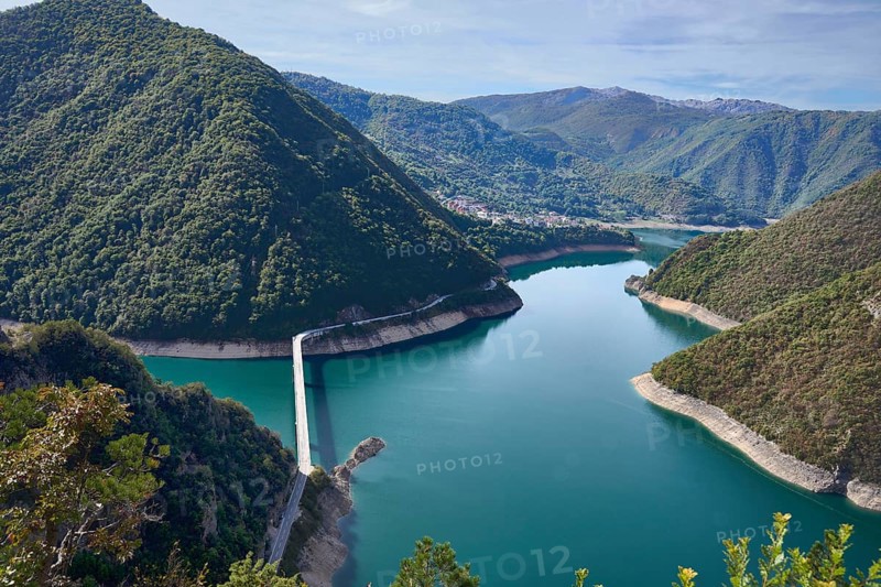 Pivsko jezero, Piva reservoir, behind the village of Plužine, bridge over the reservoir, Montenegro, Europe
