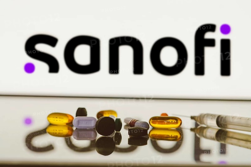 May 27, 2024, Brazil. In this photo illustration, the Sanofi logo is displayed on screen in the background with pills and medical bottle and syringe