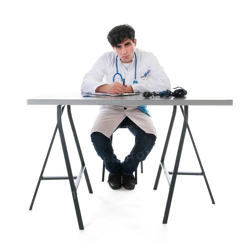 Male doctor with clipboard isolated over white background