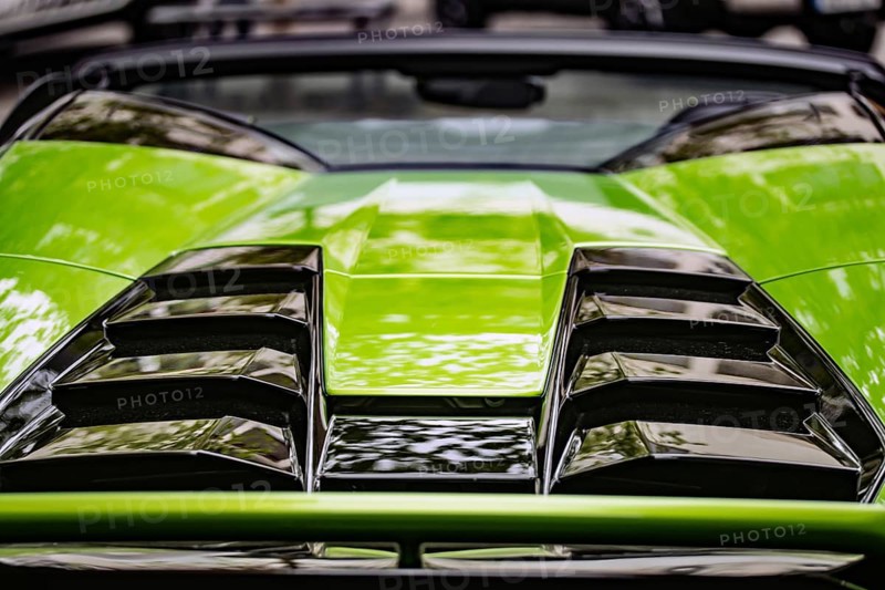 WETZLAR, Germany 2022-04-23: Lamborgini metallic logo closeup on Lamborghini car displayed