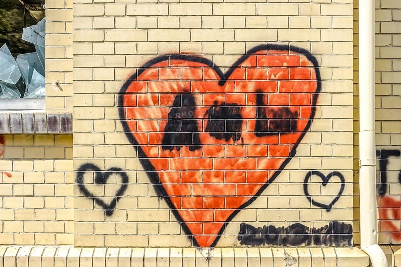 A heart sprayed on a wall as a background