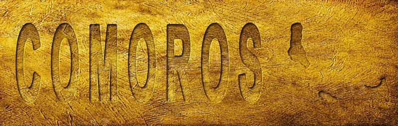 Comoros Map and Text on Grunge Gold Texture