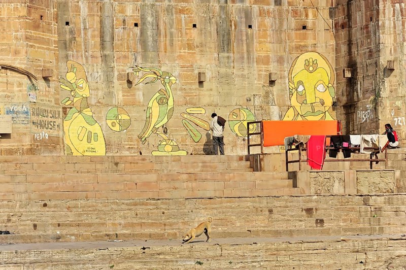 Varanasi, Uttar Pradesh, India, Asia, Wall paintings next to the steps of a Ganges Ghat with artistic figures, North India, Asia