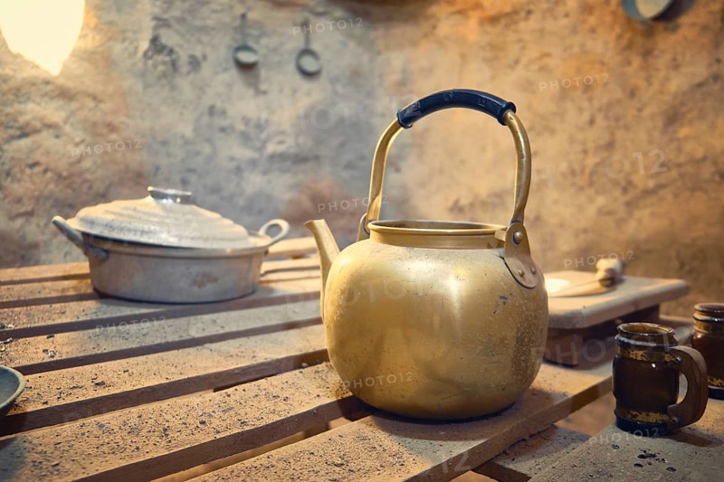 Kitchenware inside of interior of traditional mud brick made beehive houses. Harran, major ancient city in Upper Mesopotamia, nowadays is a district in Sanliurfa province, Turkiye