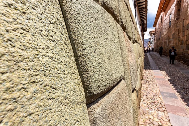 Twelve angles stone, Beautiful narrow street and buildings wall in centre of Cusco or Cuzco city, Peru. South America