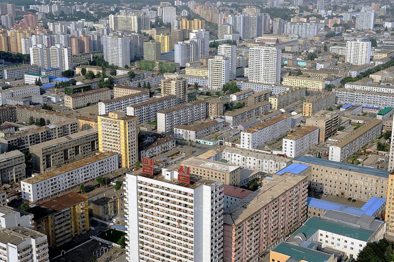 08.08.2012, Pyongyang, North Korea, Asia, A view of the centre of Pyongyang from the Juche Tower. The architecture of North Korean buildings is simple and usually very monotonous. The majority of buildings are multi-storey residential tower blocks and office blocks, Asia
