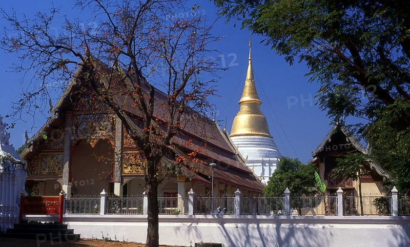 In 1436, King Sam Fang Kaen of Chiang Mai arranged for a procession of the Emerald Buddha image from Chiang Rai to Chiang Mai. The elephant carrying the image ran towards Lampang and on reaching Lampang refused to move. The king issued an order to place the image within Wat Phra Kaeo Don Tao. 32 years later it was moved to Chiang Mai.<br/><br/> Wat Phra Kaeo Don Tao (The Monastery of the Emerald Buddha on the Water Jar Knoll) is Lampang's most important temple having onced housed the Emerald Buddha (Phra Kaeo Morakot). The Emerald Buddha now resides in Bangkok's Wat Phra Kaeo (part of the Grand Palace complex), the most important temple in Thailand.<br/><br/> Lampang was originally founded during the 7th century Dvaravati period. Nothing remains from these early times, but the city is rich in temples, many of which have a distinctly Burmese flavour as Lampang had a substantial Burmese population in the 19th century, most of whom were involved in the logging industry