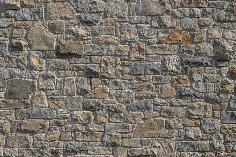 Pattern colorful of modern style design decorative. Real stone wall surface with cement. It can be used as texture or background