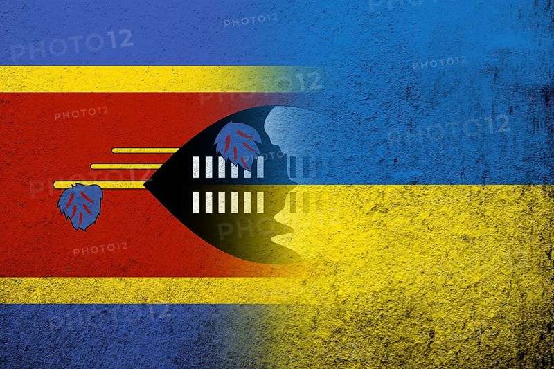 The Kingdom of Eswatini Swaziland National flag with National flag of Ukraine. Grunge background