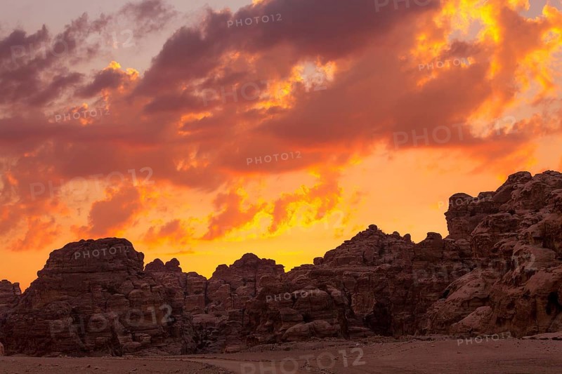 Sunset colorful orange sky landscape with sandstone rocks in Little Petra archaeological site, Jordan, Asia