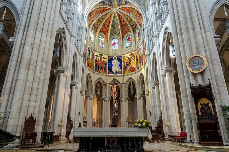 Almudena Cathedral: Iconic seat of Madrid's Archdiocese, built over a century, consecrated in 1993, adjacent to the Royal Palace
