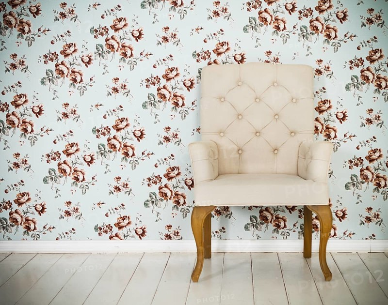 One classic armchair against a wall and floor. Copy spa