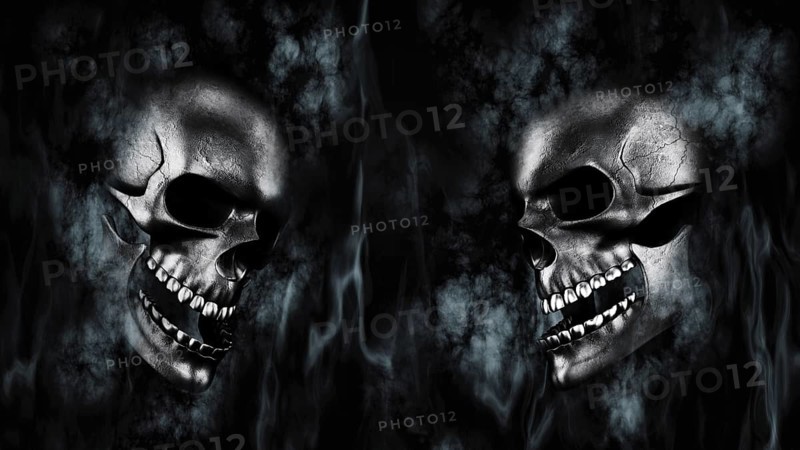 Happy Halloween. Human Skulls With Smoke And Fire 3D Rendering