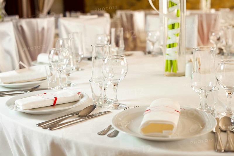 White beautiful table set for a wedding dinner