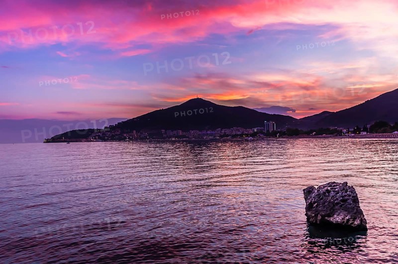 Sunset view on sea and Budva, Montenegro, Europe
