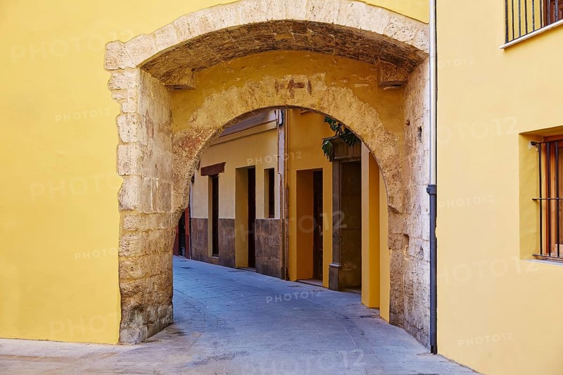 Valencia Portal de Valldigna arch in barrio del Carmen at Spain