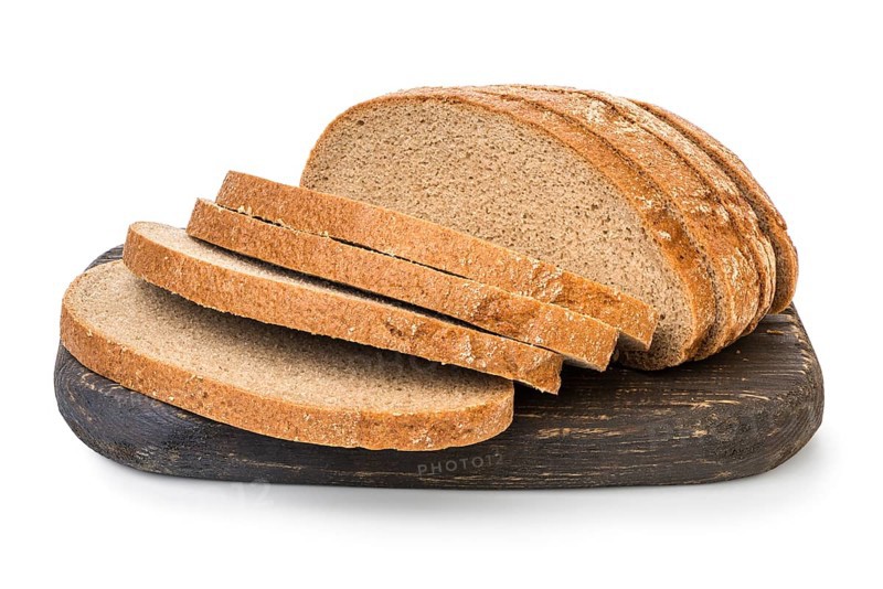 Brown bread on cutting board isolated on white