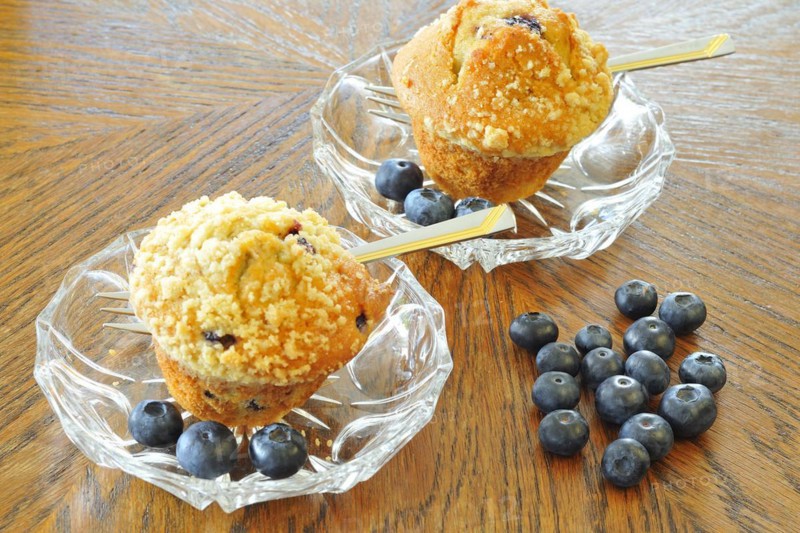 Blueberry muffins on a white plate with fresh berries, Blueberry muffins with blueberries