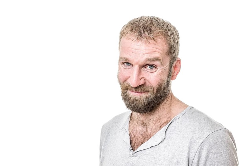 An image of a handsome bearded man casual