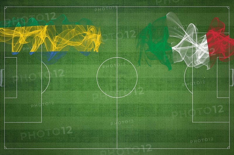Gabon vs Italy Soccer Match, national colors, national flags, soccer field, football game, Competition concept, Copy space