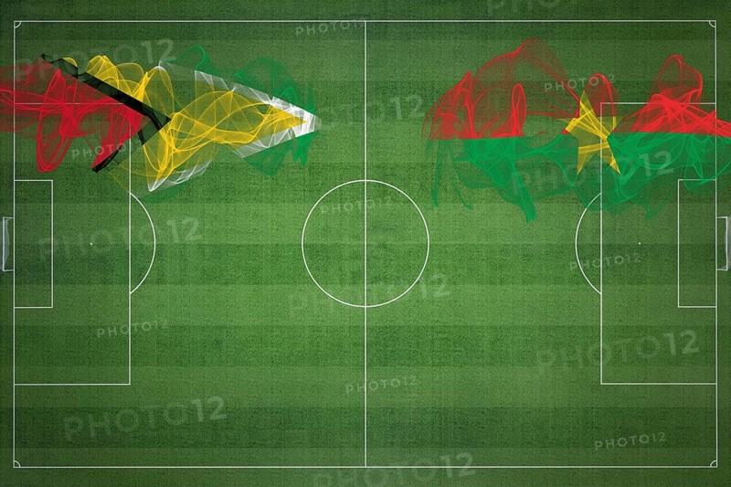 Guyana vs Burkina Faso Soccer Match, national colors, national flags, soccer field, football game, Competition concept, Copy space