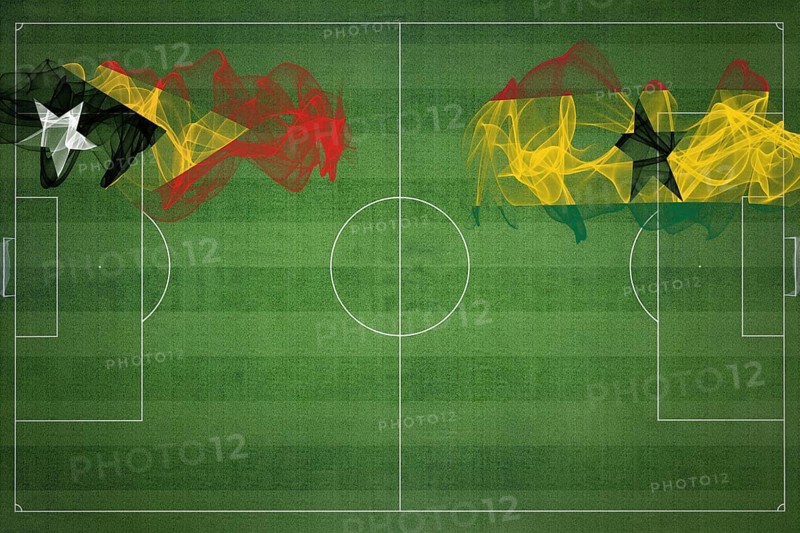 East Timor vs Ghana Soccer Match, national colors, national flags, soccer field, football game, Competition concept, Copy space