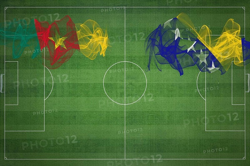 Cameroon vs Bosnia and Herzegovina Soccer Match, national colors, national flags, soccer field, football game, Competition concept, Copy space