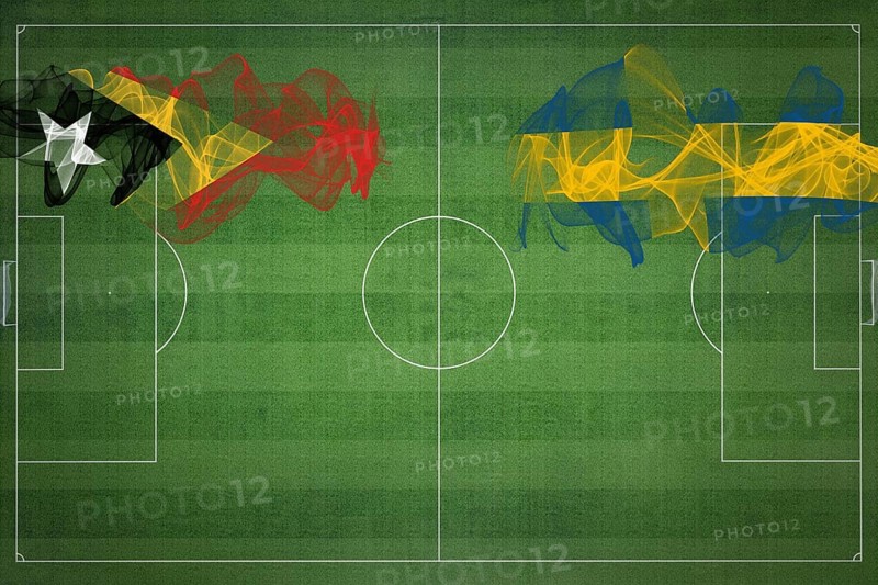 East Timor vs Sweden Soccer Match, national colors, national flags, soccer field, football game, Competition concept, Copy space