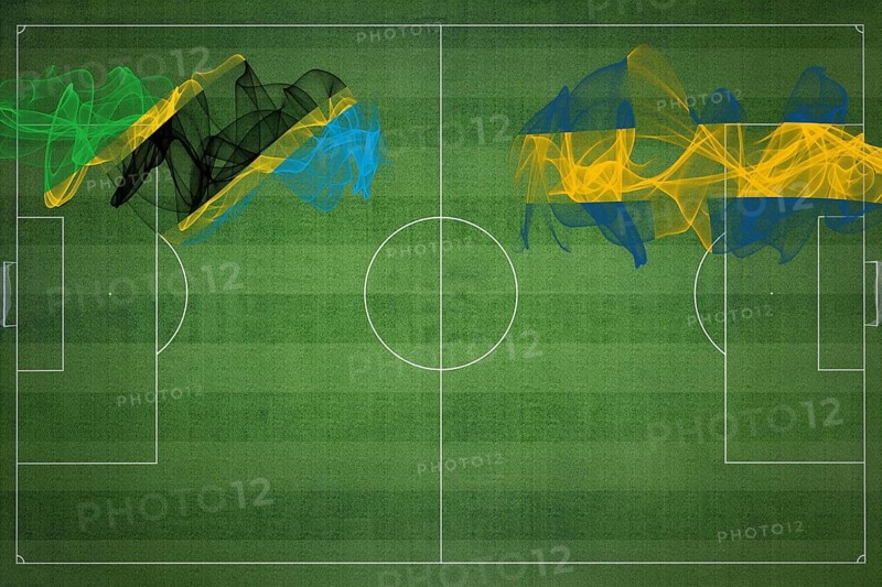 Tanzania vs Sweden Soccer Match, national colors, national flags, soccer field, football game, Competition concept, Copy space