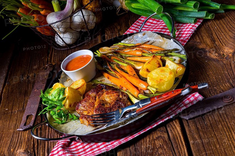 Grilled collars with caramelised vegetables