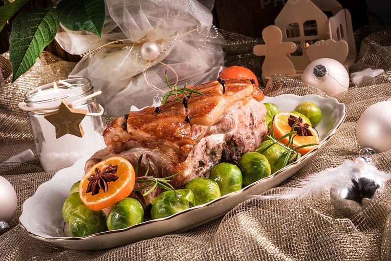 Christmas dinner with brussels sprouts in orange sauce