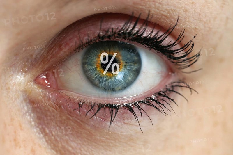 Eye with percentage sign in the pupil concept