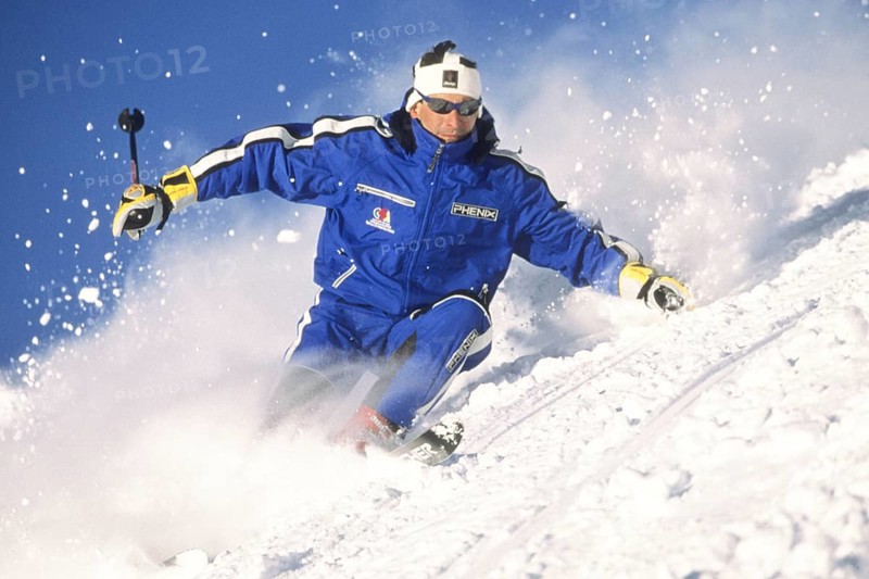 Skiers in action, deep snow, Austria, Europe