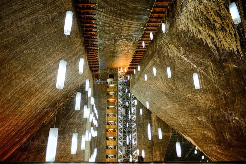 A look inside the historic Salina Turda salt mine with lights in Romania