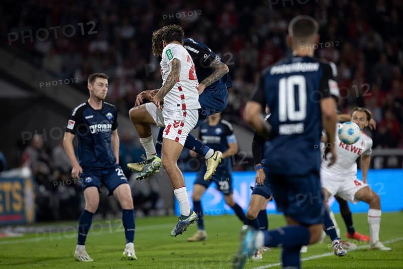 Andreas Dick (DFL/DFB REGULATIONS PROHIBIT ANY USE OF PHOTOGRAPHS AS IMAGE SEQUENCES AND/OR QUASI-VIDEO), RheinEnergieStadion, Cologne, North Rhine-Westphalia, Calvin Brackelmann (defence, SC Paderborn 07, #4), Julian Pauli (1.FC Köln, defence, #24), 2nd Bundesliga, 1.FC Köln, SC Paderborn 07 on 25.10.2024 at the RheinEnergieStadion in Cologne Germany