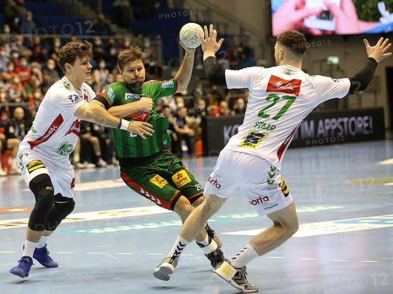 Justus Richtzenhain GWD Minden duel with Marko Bezjak SC Magdeburg SC Magdeburg, GWD Minden Handball Männer DHB-Pokal quarter-final season 2021-2022 on 06/02/2022