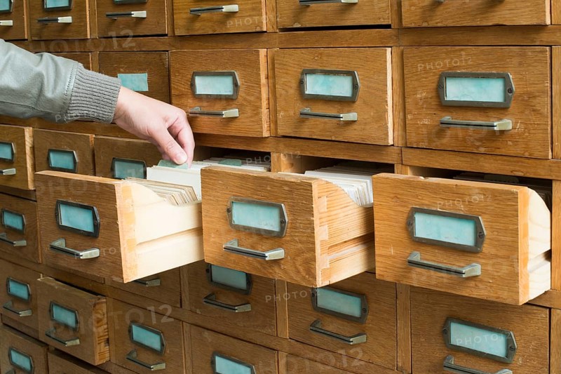 Old archive with wooden drawers