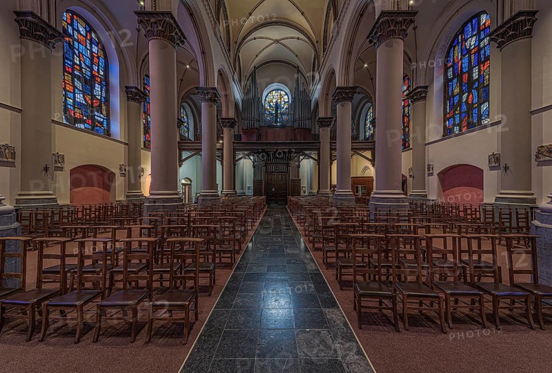 Brussels Old Town, Brussels Capital Region, Belgium, 12 12 2019 Symmetric interior design with stained glass of the Carmelites church, Europe