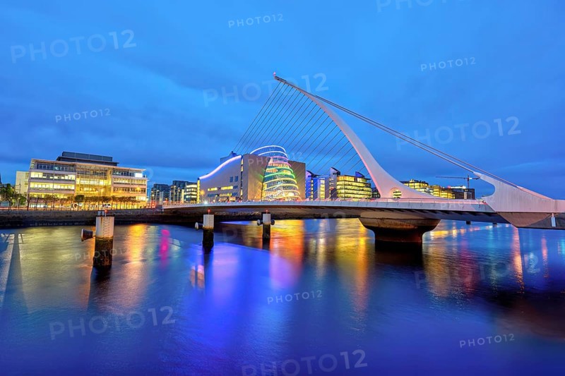 The River Liffey with the Samuel Beckett Bridge in Dublin, Ireland, at dusk, Europe