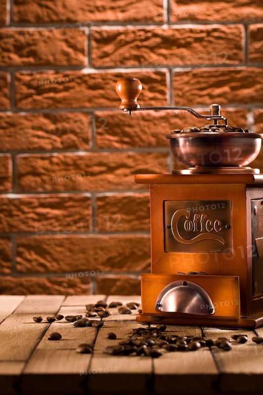 Wooden coffee grinder on table