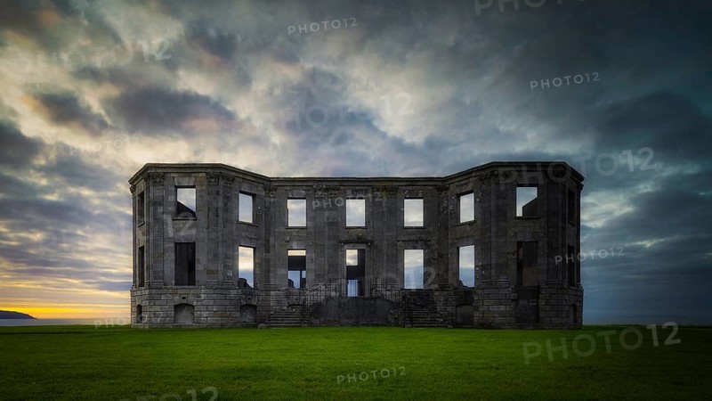 Ruins of Downhill Demesne with dramatic, moody sunset, front view, National Trust, Castlerock, County Antrim, Northern Ireland