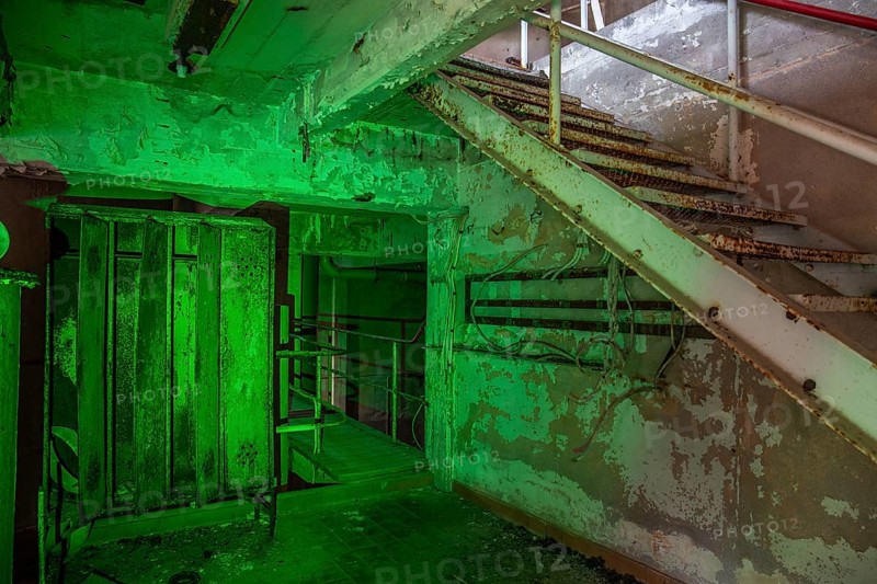 Old abandoned paper factory. Historic and typical factory building as a lost place. Destruction and decay are damaging the substance. Original machines and objects can be found here in Sweden