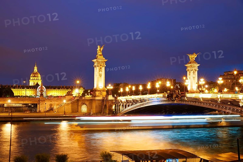 Pont Alexandre III in Paris France sunset over Seine river