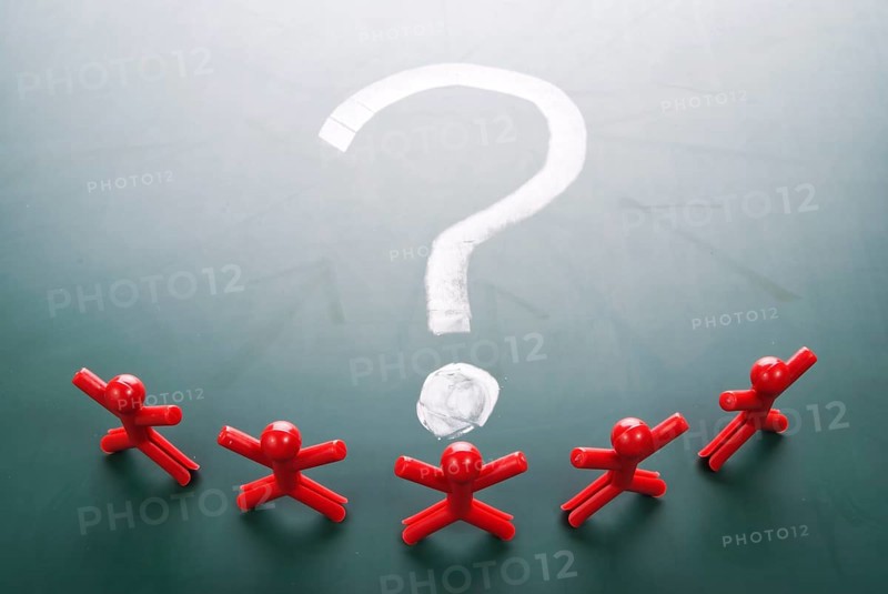 Business team face a big question mark.