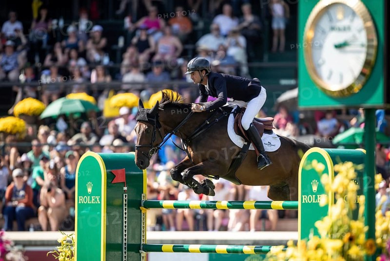 Steve Guerdat of Switzerland and riding Venard de Cerisy compete in the first round of the 1.60m CPKC International during the Spruce Meadows Masters, presented by Rolex, in Calgary, Alberta, Canada, North America