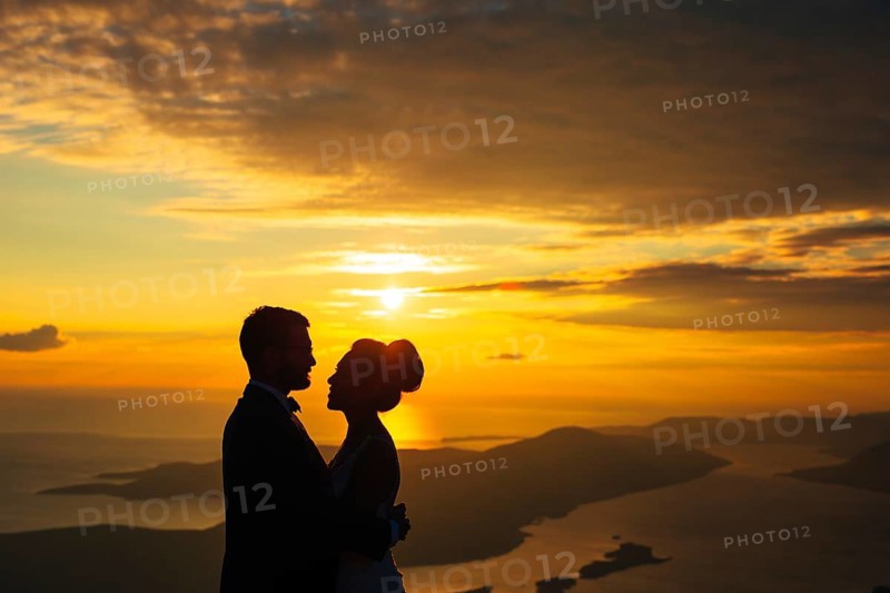 Silhouettes at sunset on Mount Lovcen in Montenegro
